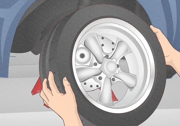 Tháo đai ốc bánh xe ra khỏi lốp xe