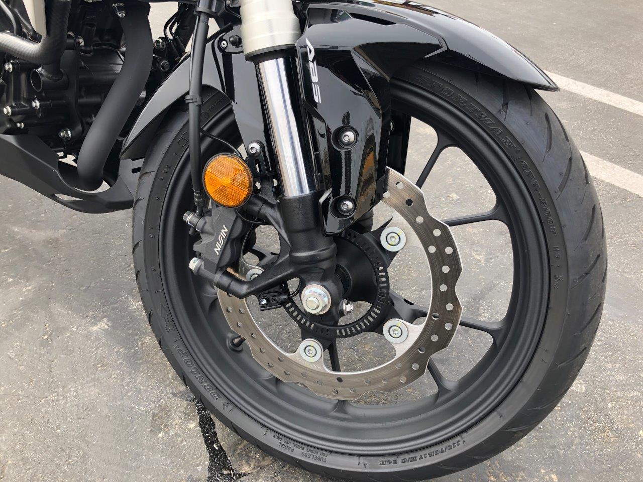 2019 Honda CB300R on the road.