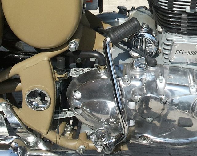 the engine along with the kick start and starter motor in bright chrome and allow