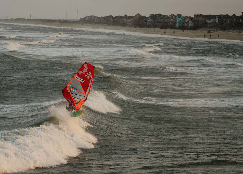 Phil Soltysiak CAN 9 windsurfing freestyle board wave riding at the Avon Pier in Cape Hatteras, North Carolina - Photo by Adam Wojtkowiak