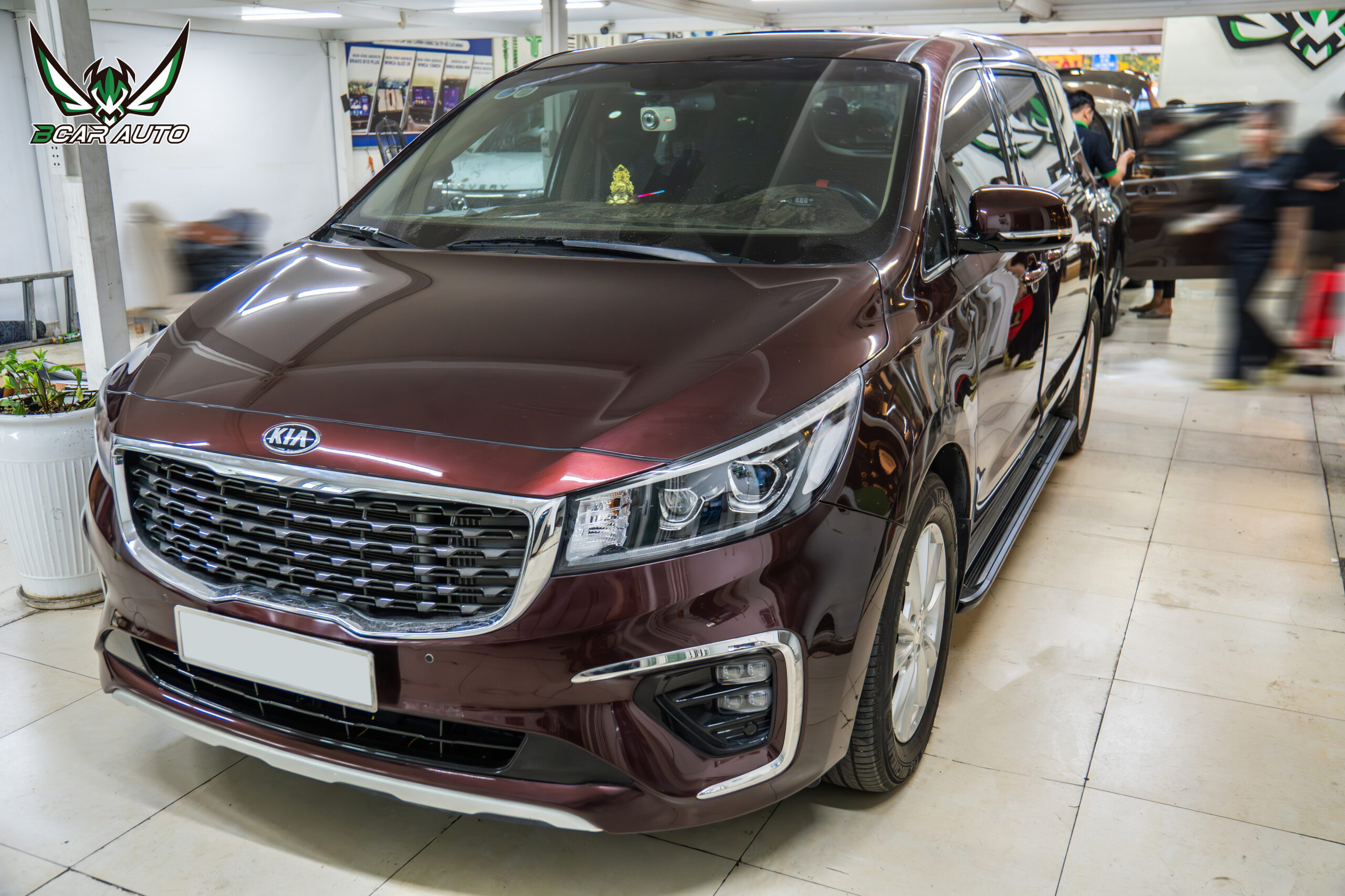 Lót sàn gỗ Căm Xe Kia Sedona