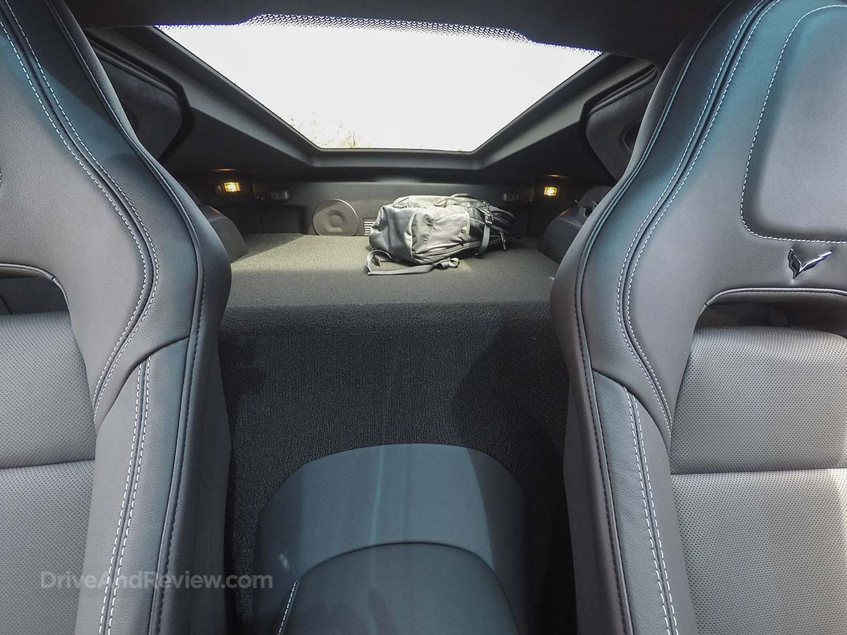 2016 corvette stingray in silver parked at the shores of Lake Michigan