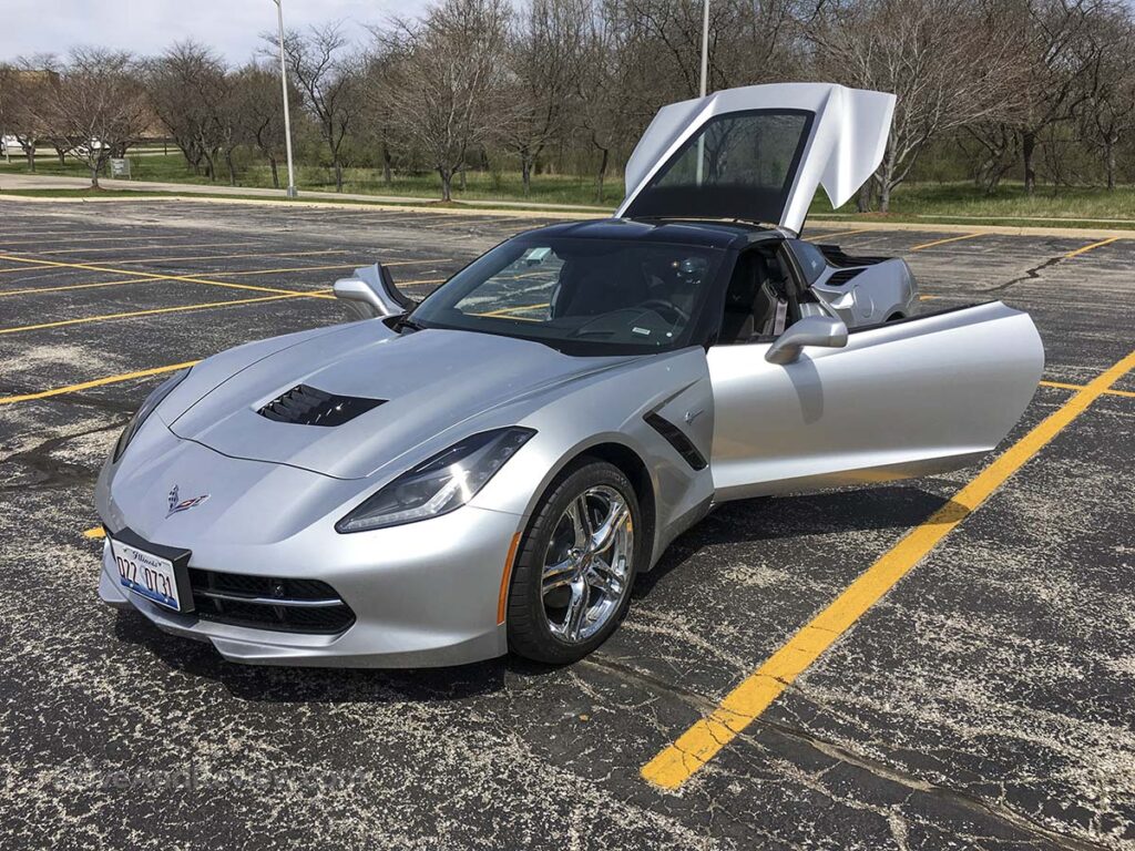 Silver 2016 Corvette Stingray doors and rear hatch open front view
