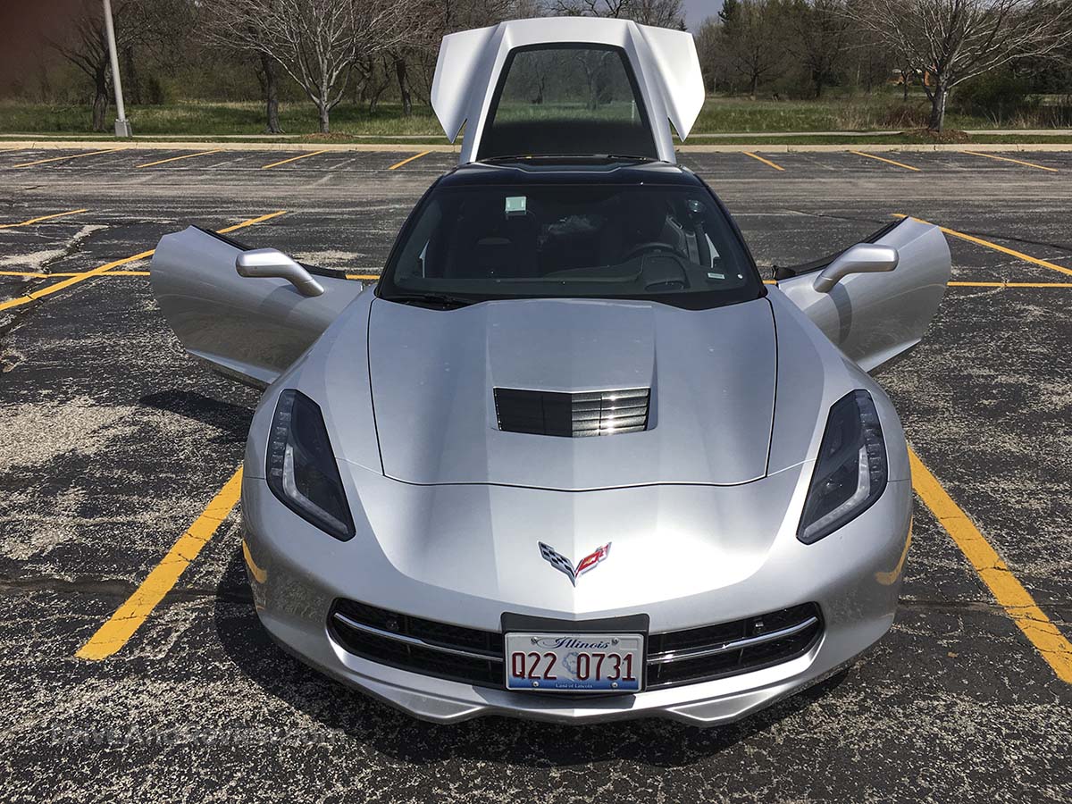 Silver 2016 Corvette Stingray doors and rear hatch open rear 3/4 view