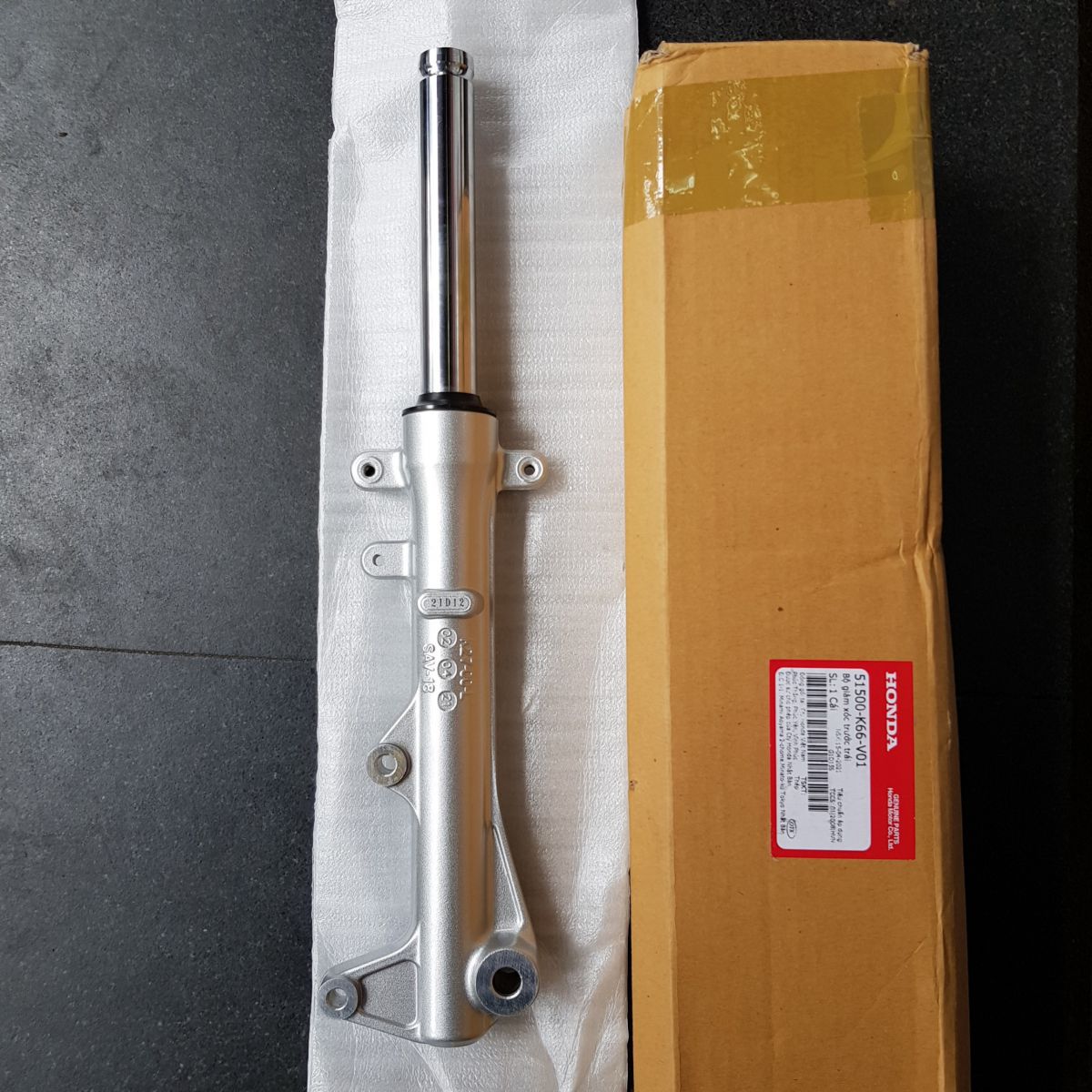 Phuoc-nhun-giam-xoc-truoc-Airblade-125-chinh-hang-Honda-4b