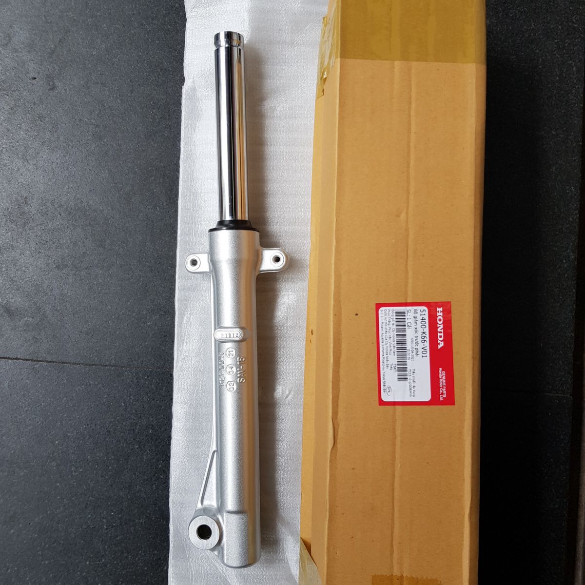 Phuoc-nhun-giam-xoc-truoc-Airblade-125-chinh-hang-Honda-3b